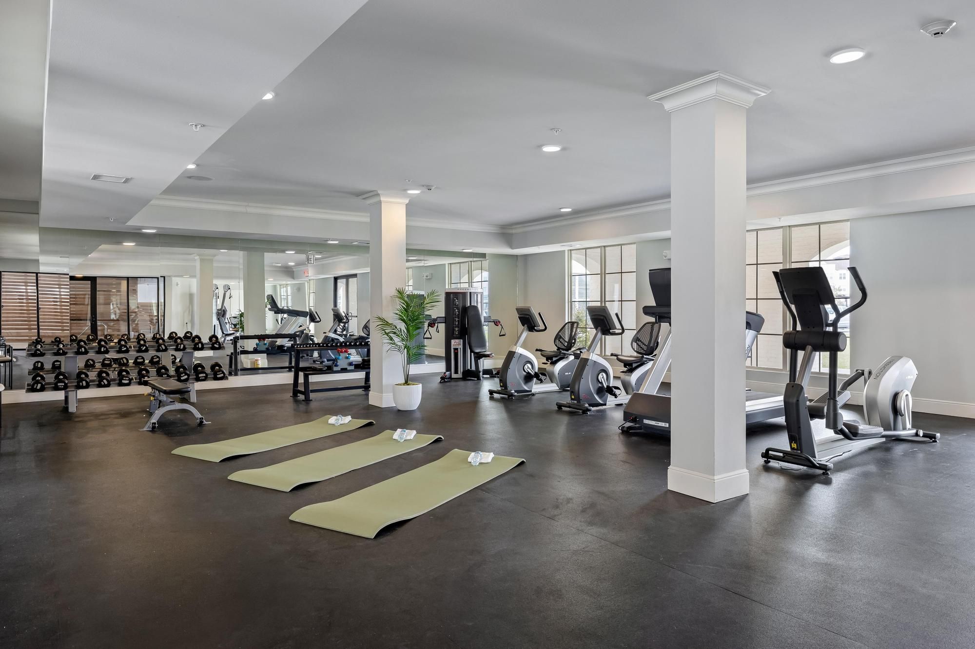 The Claiborne at Baton Rouge gym with exercise equipment and on-site therapy services